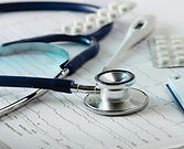 Stethoscope on the Cardiogram