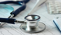 Stethoscope on the Cardiogram