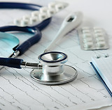 Stethoscope on the Cardiogram