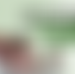 Teacher helping students in a classroom. One child looks down, another writes. Text: "WHY YOUR CHILD TALKS AT HOME BUT IS QUIET IN CLASS".