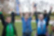 Children with their race medals smiling