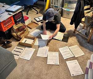 Josh on the Floor with Filming Surveys.jpeg