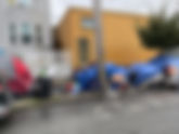 ENORMOUS ENCAMPMENT TAKES ROOT UNDER OUR WINDOWS