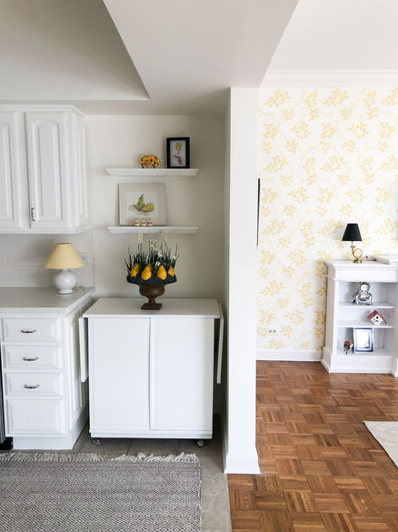 yellow floral wallpaper from farrow and ball, architectural view of opening, white kitchen