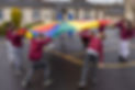Students playing with a parachute in the playground (Online Only do NOT Print )