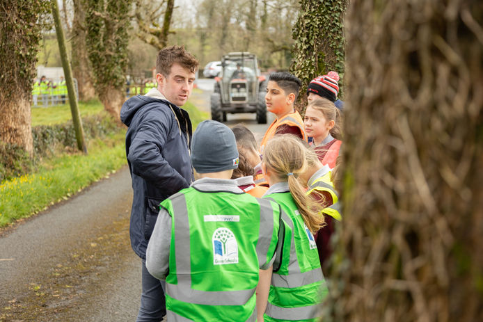 Teacher with student walking outdoors  (Online Only do NOT Print )