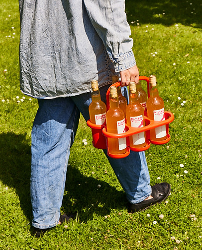tiets sidra bottles in a basket