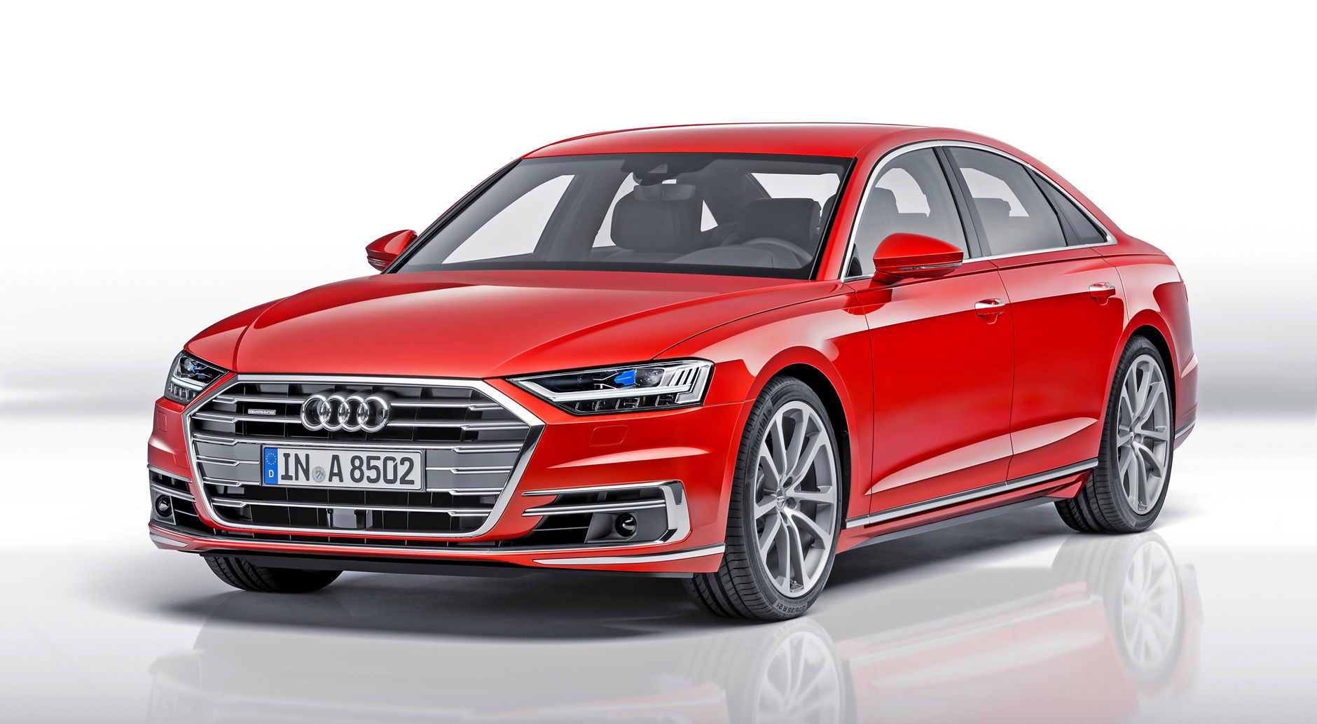 Audi A8 rood zij en voorkant links in studio_edited.jpg