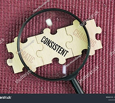 stock-photo-magnifying-glass-and-puzzle-with-the-word-consistent-and-its-two-opposite-word