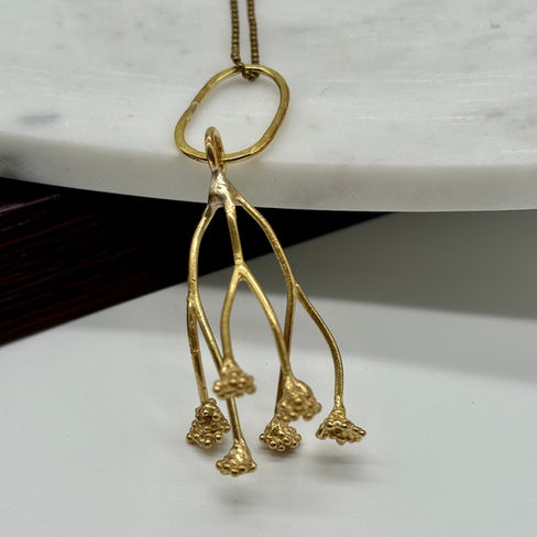 Hand crafted flower pendant