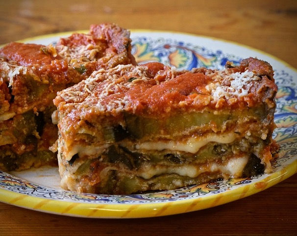 Eggplant parmesan slices on Italian pottery plate from authentic eggplant parmesan recipe