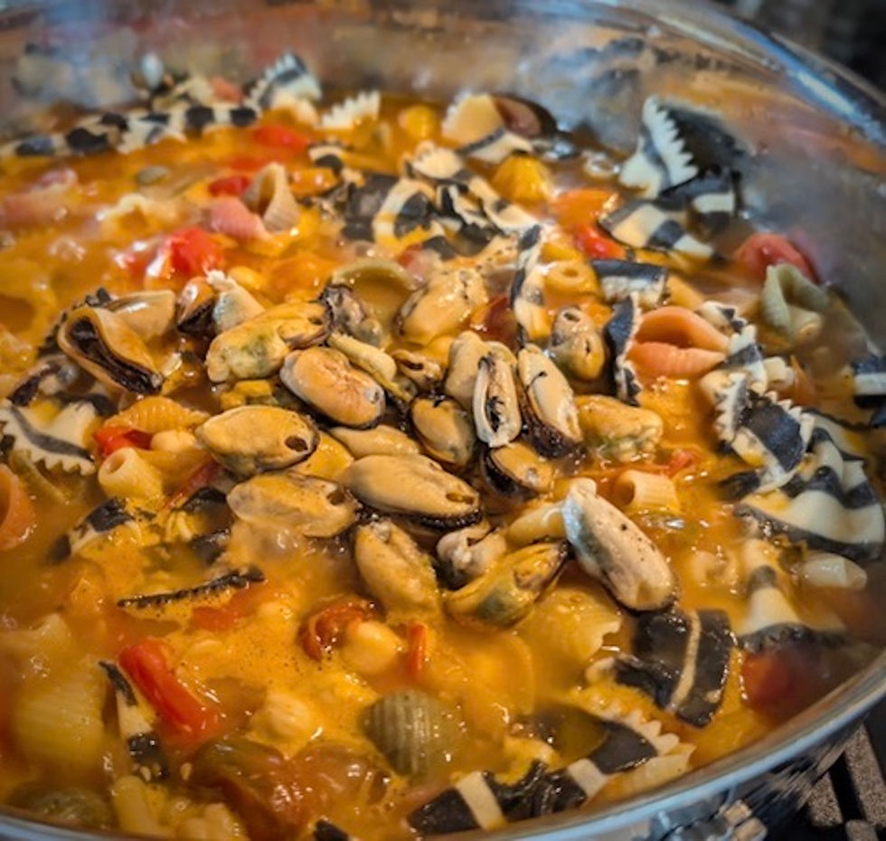 Pasta Fagioli con ceci e Cazze in a large pot cooking