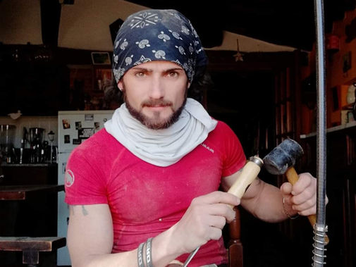 "Exploring the Beauty of Artisan Rey's Wood Sculptures in Italy"