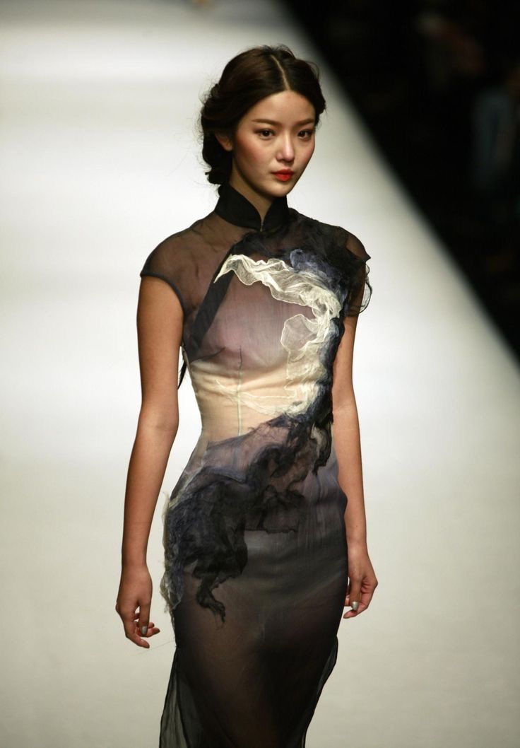 Runway image sourced from Pinterest for editorial inspiration.