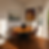 Consultoria de Interiores Online - Casa Espelho Sala de jantar com mesa redonda, galeria de quadros e decoração com personalidade.