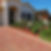 Paved walkway with garden