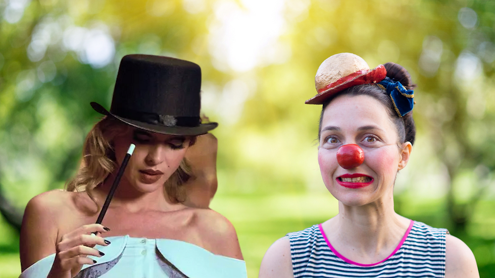 A magician in a top hat holds a wand, standing beside a clown with a red nose and hat. They pose outdoors with a blurred green background.