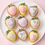 Thumbnail: A 9-piece box of pastel Easter chocolate-covered strawberries with bunny and egg decorations