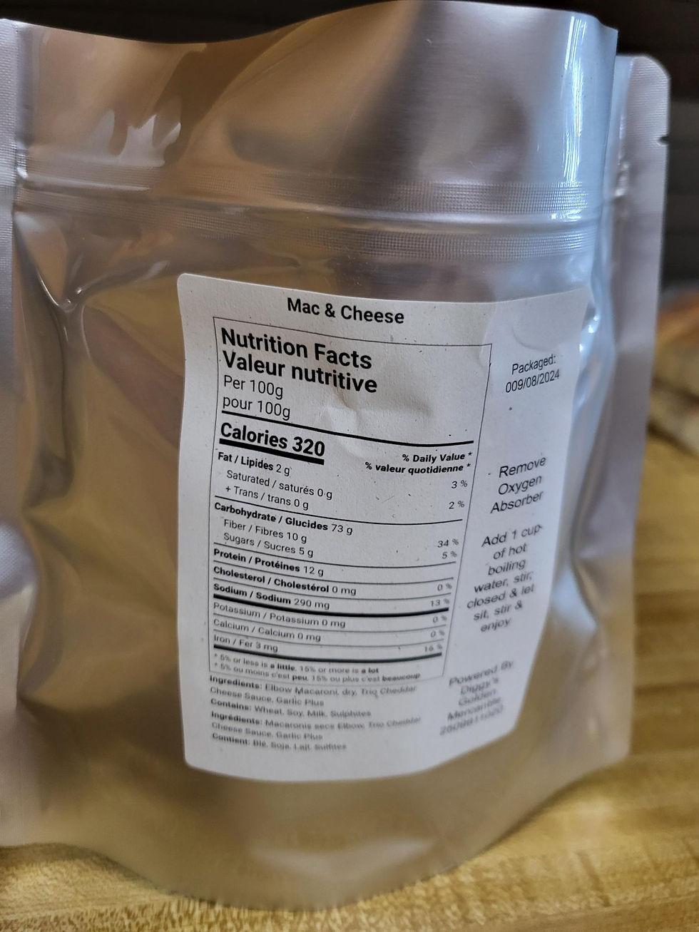 "Silver package of 'Mac & Cheese' by Moose Island Foods with a detailed nutrition label highlighting values like 320 calories, 2g fat, and 12g protein per 100g. Includes instructions to 'Remove Oxygen Absorber.' Packaged for easy preparation."