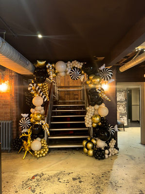 Luxury arched backdrop sailboard with bespoke event styling