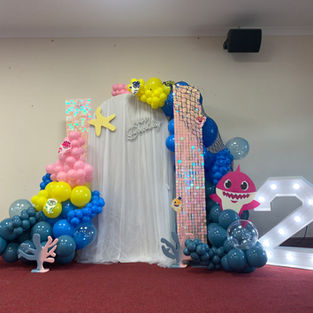 Minnie mouse disney babyshark themed birthday with classic balloon décor and neutral styling