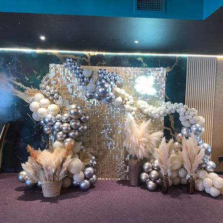 Luxury event backdrop and sailboard styling with bespoke decor