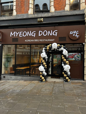 Luxury arched backdrop sailboard with bespoke event styling