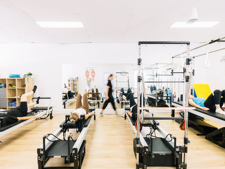 Small group clinical Pilates session at Perkins Physiotherapy & Pilates, Adamstown NSW