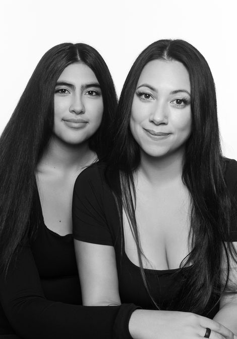 black and white image of mother and daughter hugging for fashion family portrait