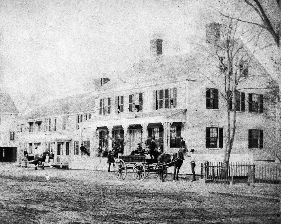 This busy, pleasantly posed 1870s view of Central House is from a stereoscope card. The mid-section is the oldest part, built in 1729 as a home for the Revered Benjamin Fessenden. Photo courtesy of John Nye Cullity.