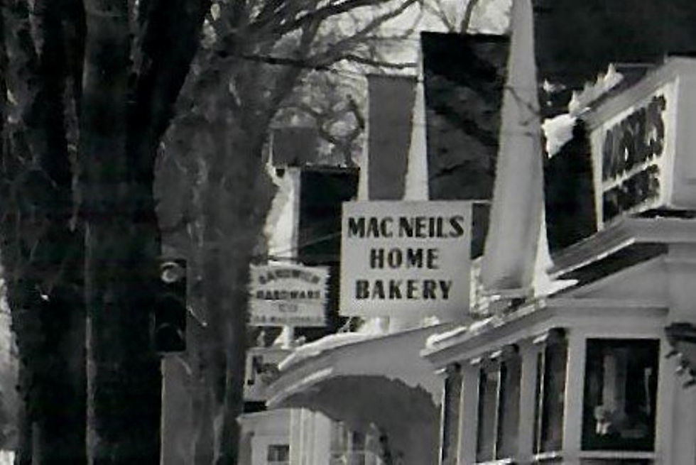 JARVES STREET IN THE 1960s, showing Russell’s Market, MacNeil’s Bakery, MacDonald’s Sandwich Hardware, and Newman’s clothing store. (Photo from Sandwich Archives as modified by John Walker)