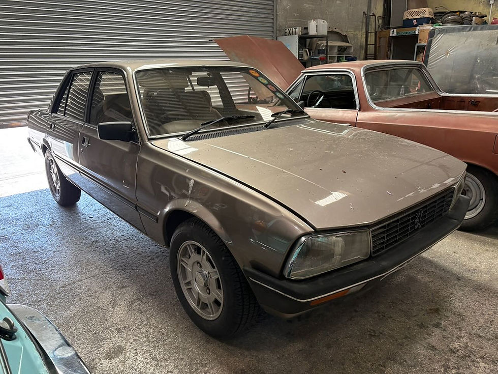 Peugeot 505GTi in the workshop