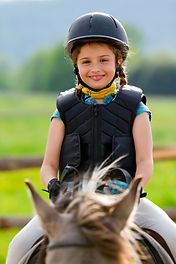 Horse riding, portrait of lovely equestrian on a horse.jpg