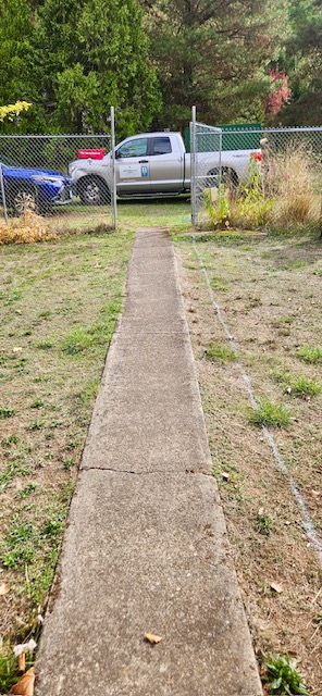 Mini driveway for motorcycle parking.