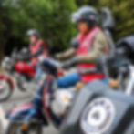 Trainees during CBT motorcycle training with ACBT London. A scooter and a manual bike are bvisibile.