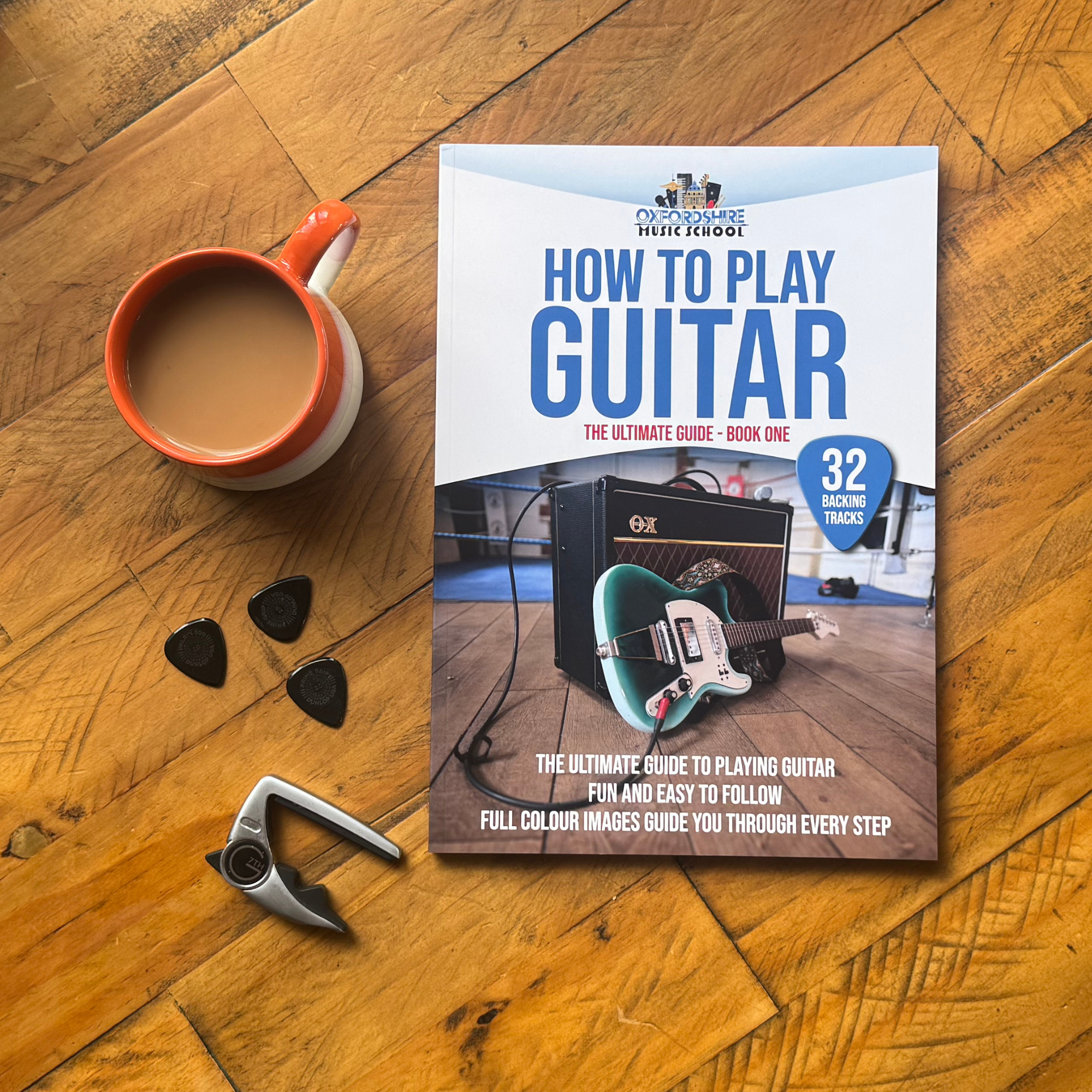 How To Play Guitar - Tom Dalby