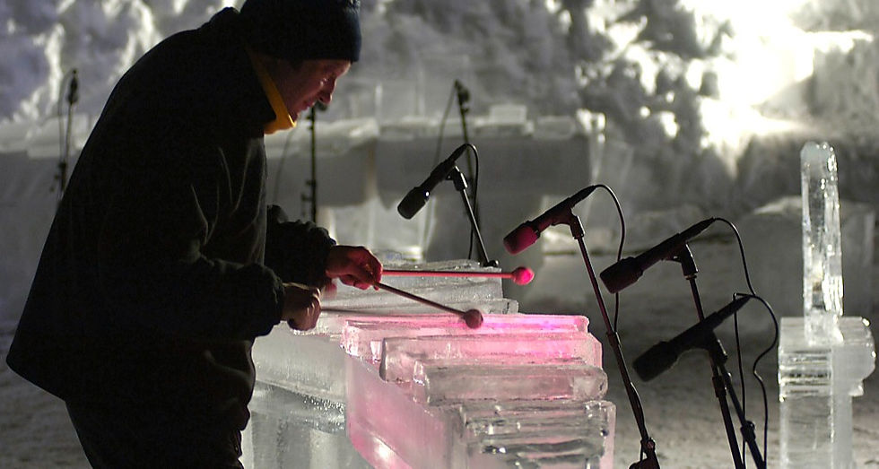 TalkingSticks_photo_Lipner-playing-ice-xylo-side-mics_edited.jpg