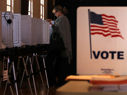 a woman voting at a polling place