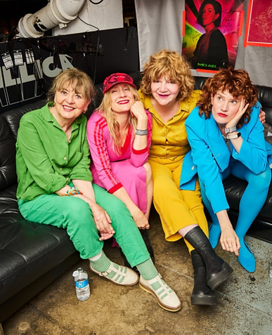Gina (centre-right) and her band, The Unreasonables, in August 2025
