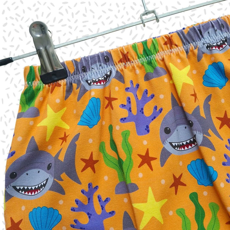 Children's handmade 'Little Summer Shark' print organic harem shorts.
