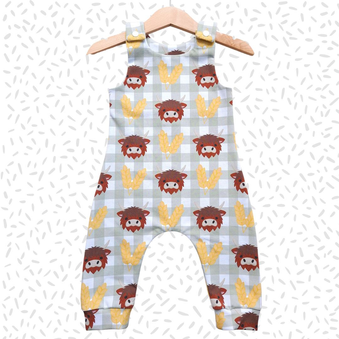 Children's handmade 'Little Highland Cow' print organic baby and toddler romper.