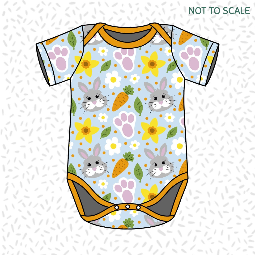 Children's handmade 'Little Spring Bunny' print organic baby bodysuit.