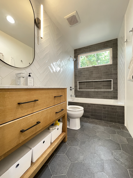 garage tile stone veneer home construction renovation contractor tile contractor lighting design designer remodel general contractor kitchen backsplash sink slab refrigerator fridge ikea cabinets floating shelves bathroom tub niche toilet bathroom vanity lighting