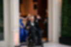 Mother and father of the couple entering into the reception