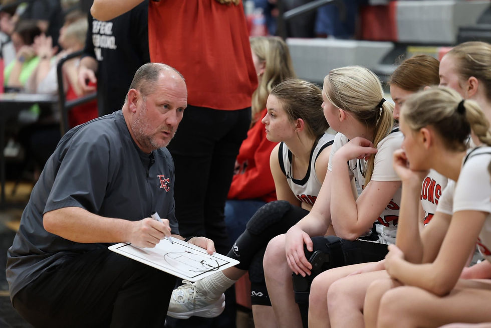 Russ Gerlach(My Dad) drawing up a play this last year in his return to coaching.