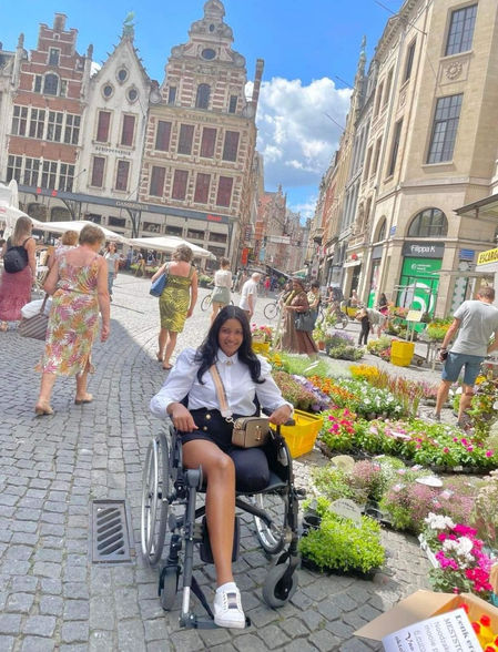 Mitera Balkaran in a wheelchair in Leuven, Belgium
