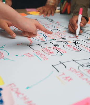 Collaboration in Action_ Team Members Engaging in Brainstorming Session with Post-it Notes