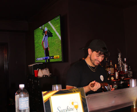 Sunshine Sips bartender mixing handcrafted mocktails at Joe’s private celebration in Berlin, NJ ay the Cue Box