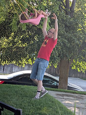 Reed Swinging Rosa at the Francis Family home