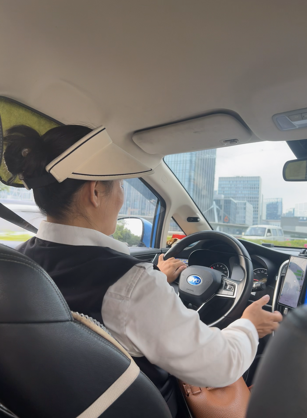 Ms. Li (Li Mei) driving me toward Huizhou